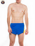 A j javelin field short swim trunks with a solid blue front and yellow side panels in american jack colors