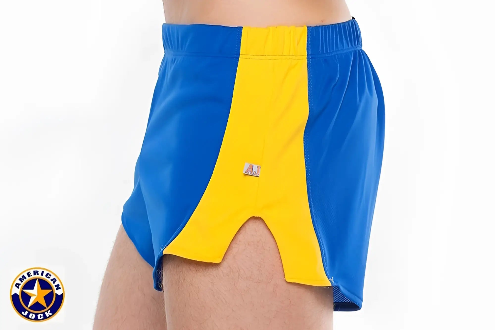 A j javelin field short blue and yellow athletic shorts with mesh panels elastic waistband and brand logo on side