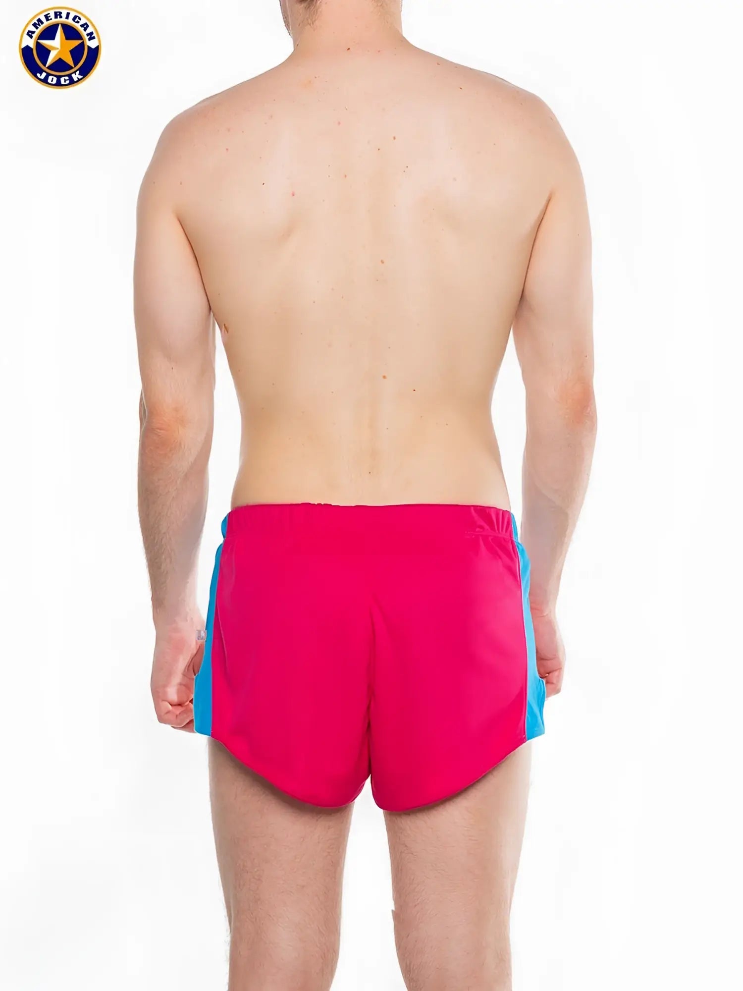 A j javelin field short bright pink athletic shorts with blue side panels and snug elastic waistband in smooth fabric