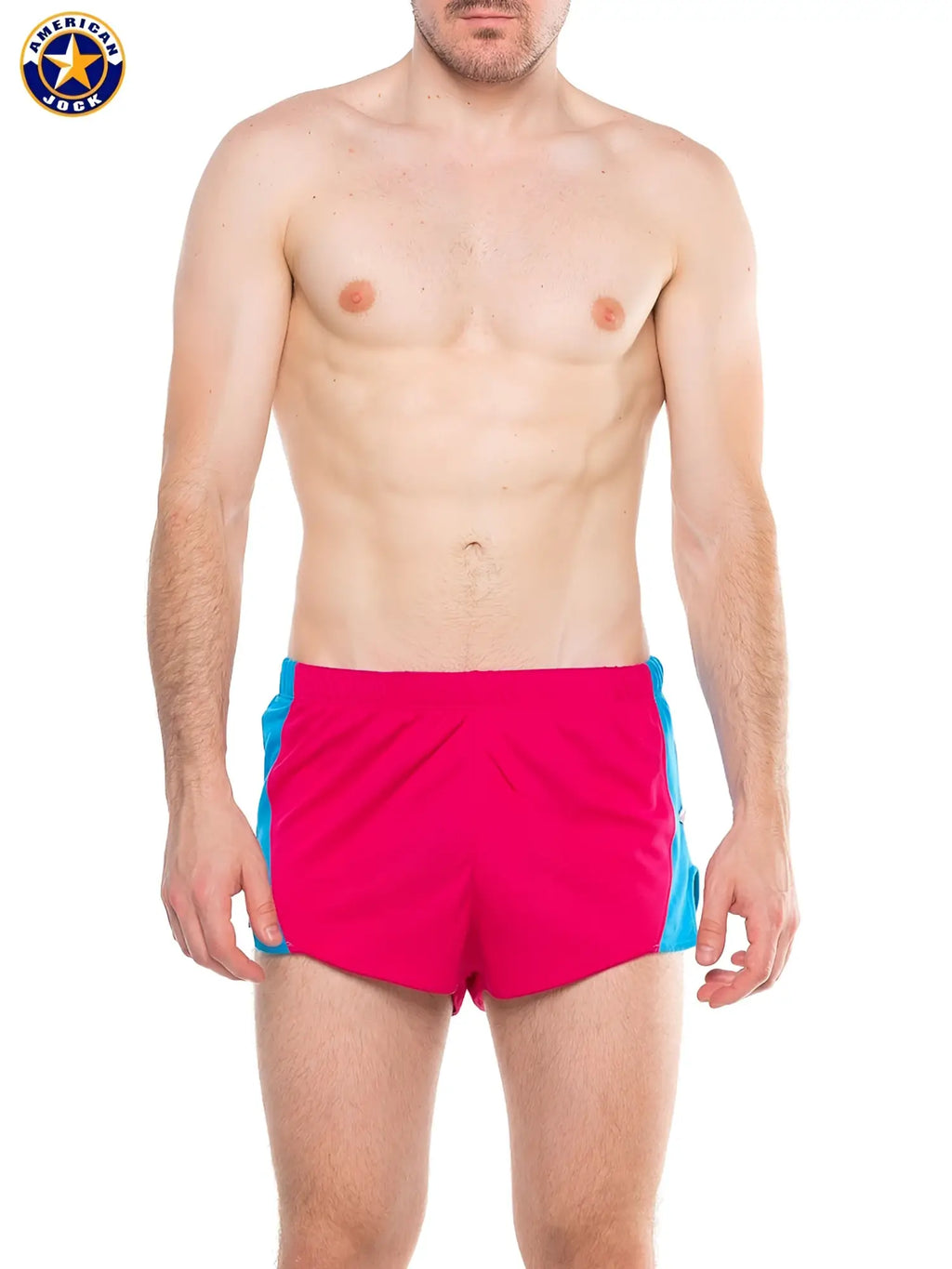 A j javelin field short bright pink athletic shorts with blue side panels made from lightweight synthetic fabric
