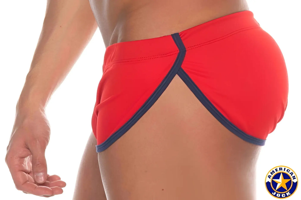 Red american jock swim trunks with navy blue trim in aj phys ed cool down short style for active wear