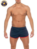 A J Phys Ed track short in navy blue athletic fabric with red trim and a small American jock logo on the side
