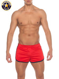 A j phys ed track short in red with navy blue trim featuring american jock athletic design