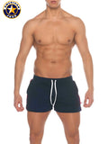 Navy blue american jock swim trunks with white drawstring and red side accents featuring pockets for active use