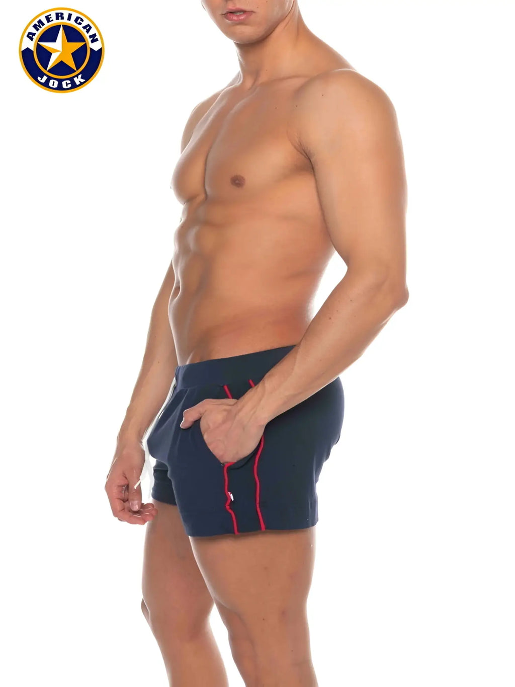 Navy blue a j phys ed volley shorts with red piping and classic american jock logo on left leg with pockets