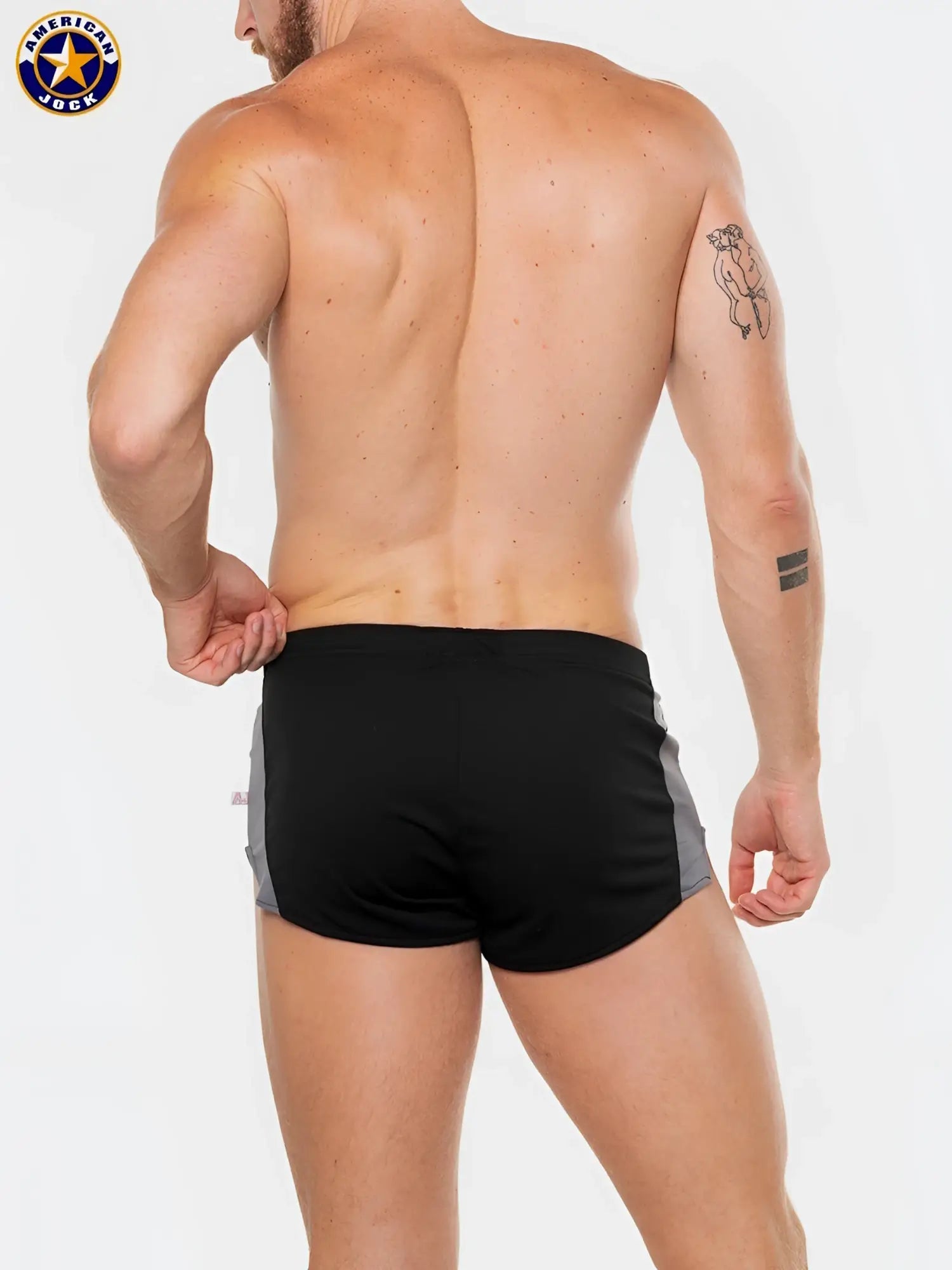 Black and gray american jock swim trunks with a sleek athletic design from a j physique cross country short collection