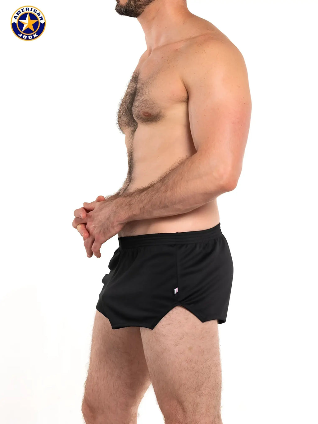 A j ultra running short in black athletic fabric with a subtle side slit and small white logo on the lower left leg