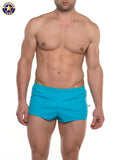 Bright turquoise american jock swim trunks designed as a j ultra running short for athletic use