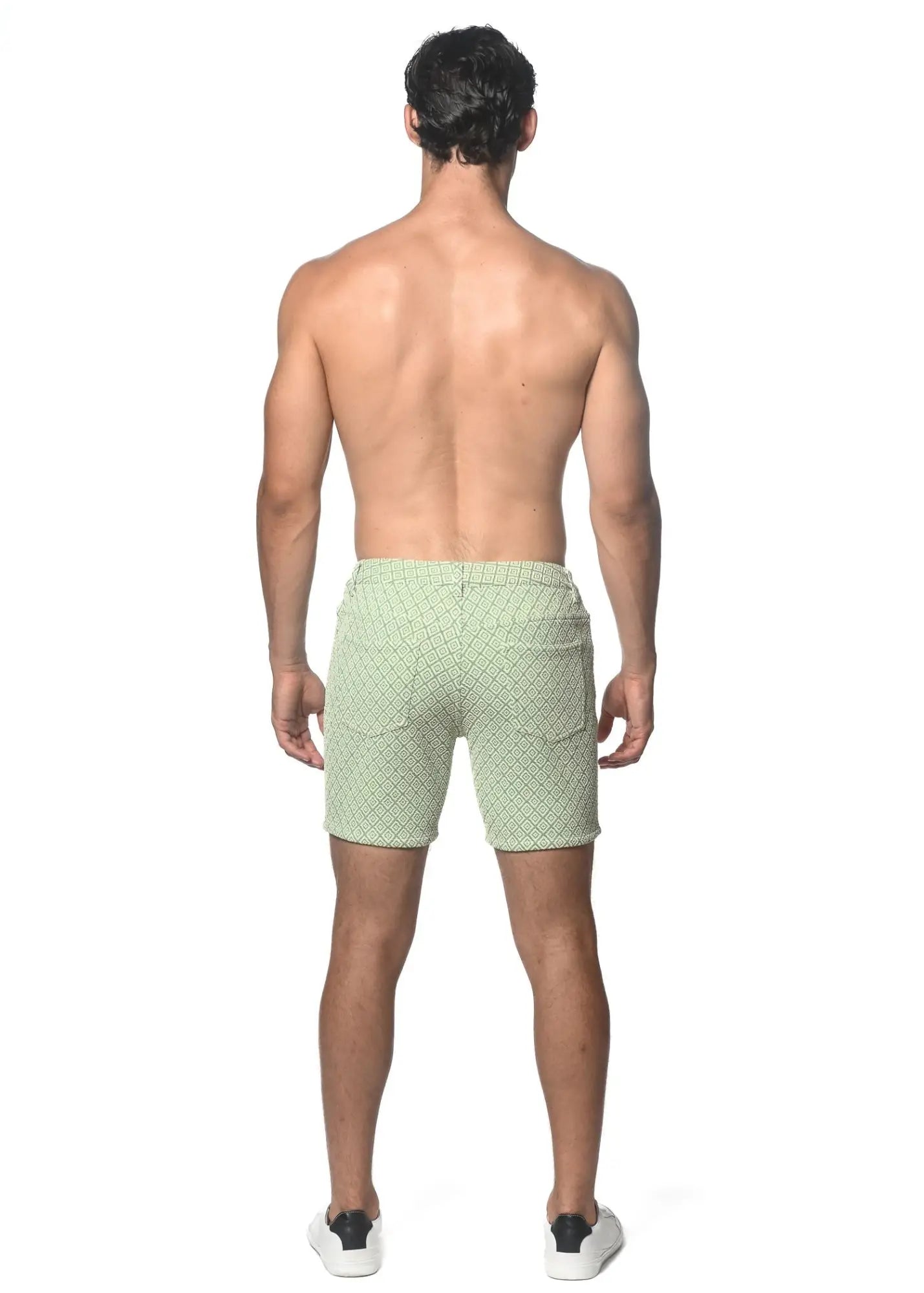 Light green jacquard printed stretch knit shorts with subtle geometric pattern for casual wear