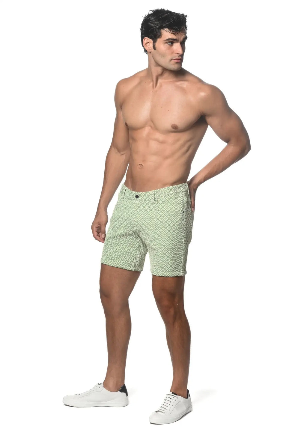 Light green jacquard printed stretch knit shorts with subtle geometric pattern in textured fabric