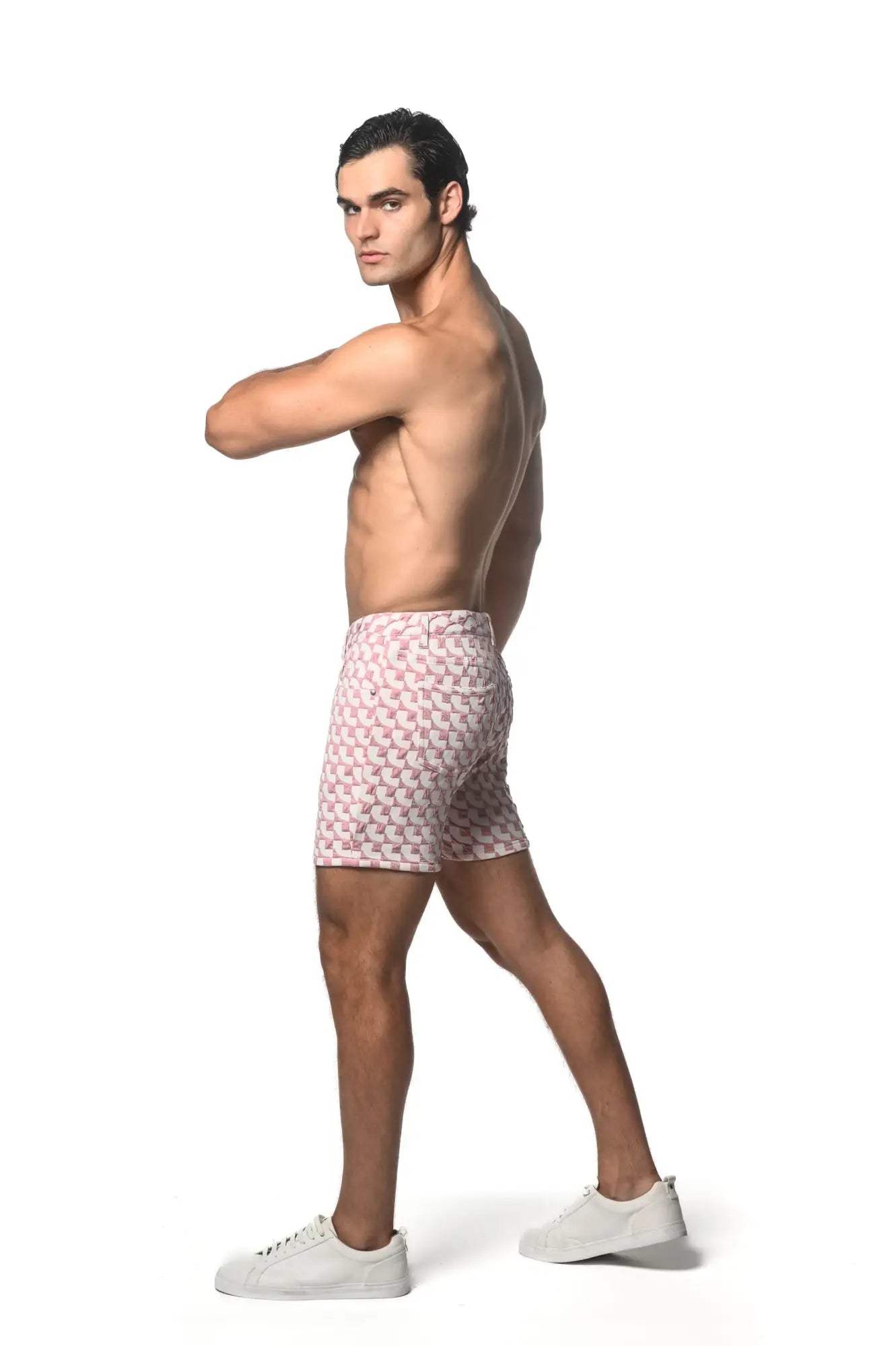 Men’s jacquard printed stretch knit short in pink and white geometric pattern swim trunks front view