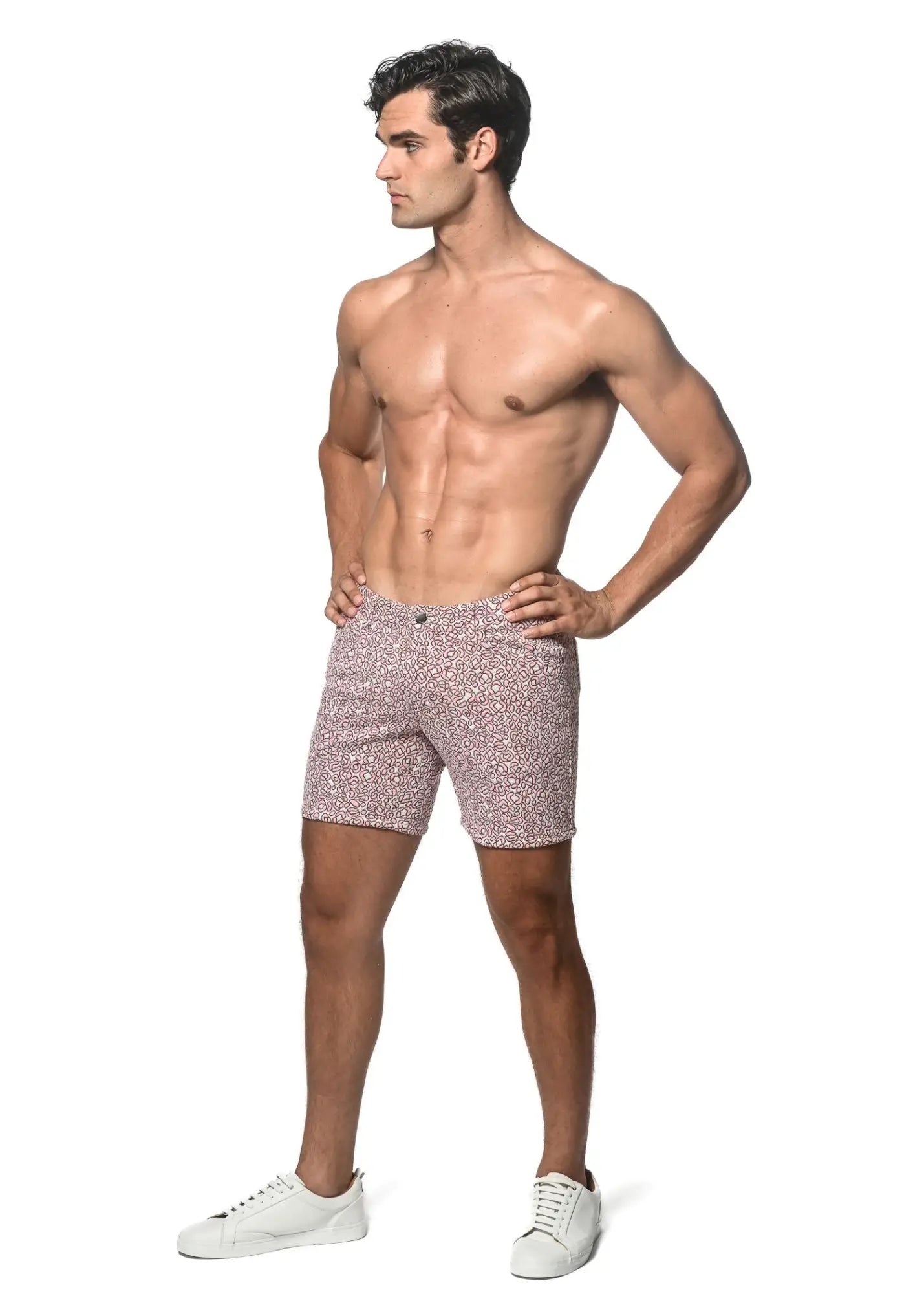 Patterned pink jacquard printed stretch knit shorts with a subtle speckled design for comfortable wear