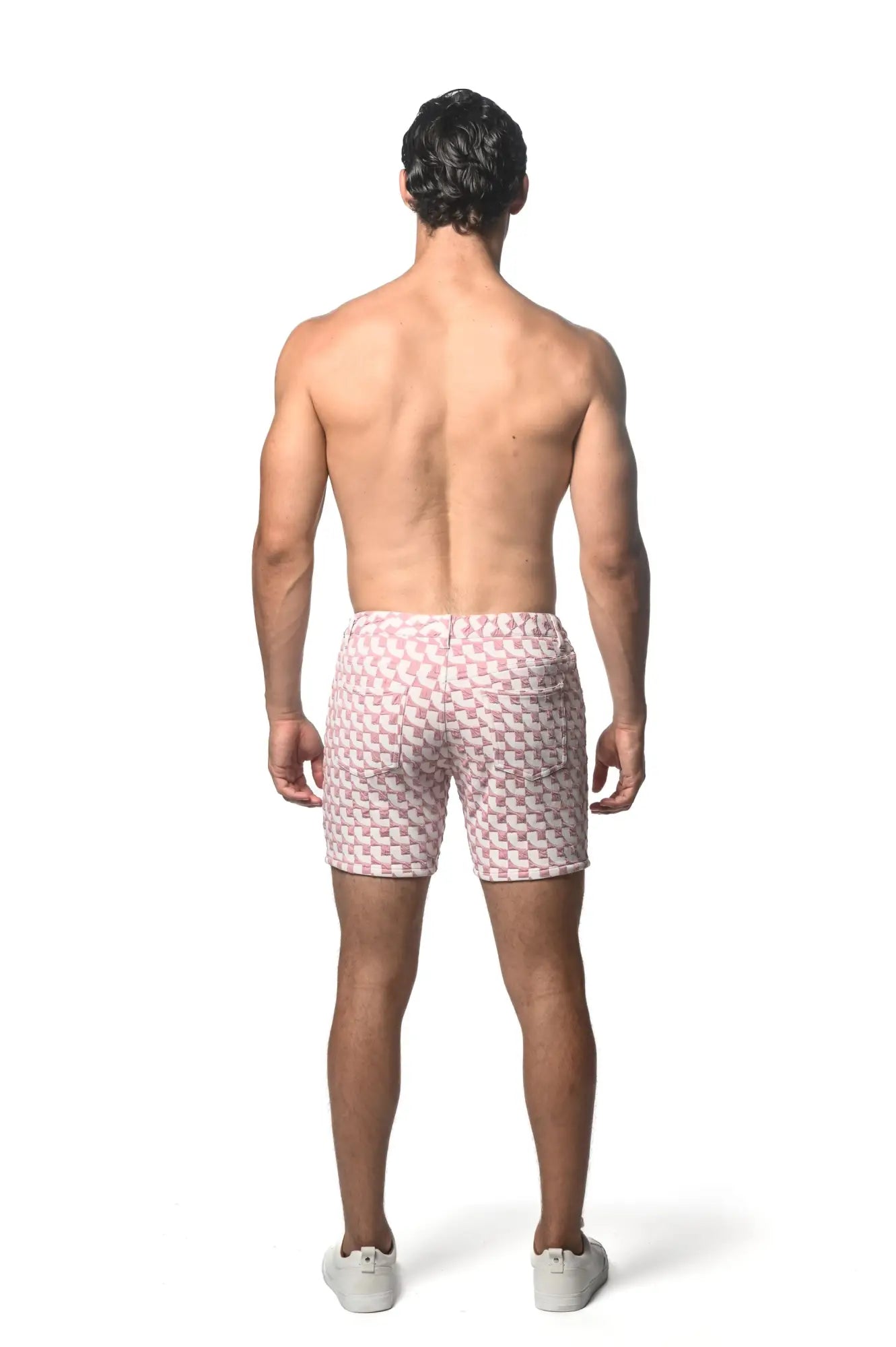 Pink and white jacquard printed stretch knit short swim trunks with geometric pattern for beachwear