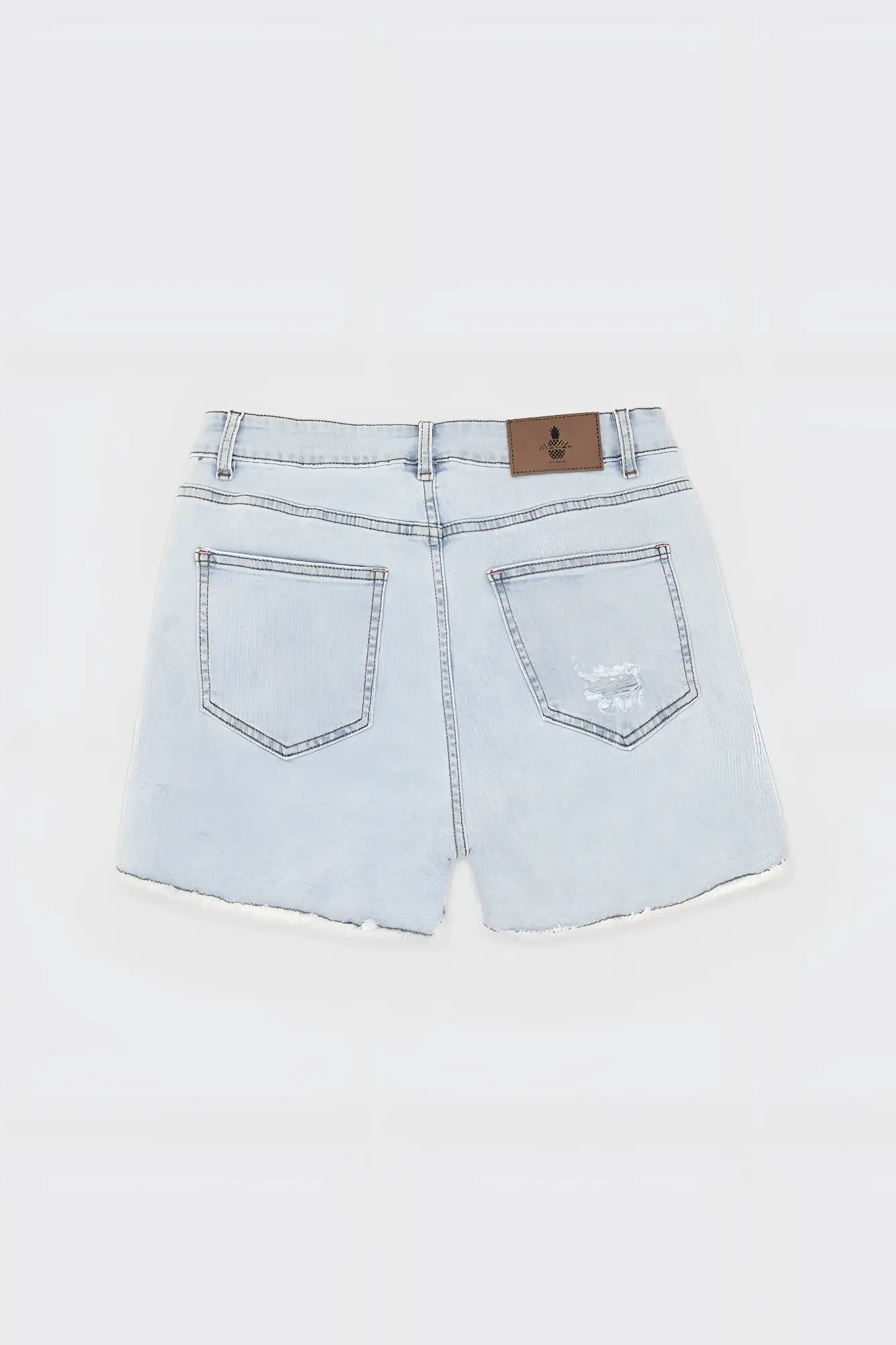 Light sky blue jaded 3.5 inch denim short shorts with frayed hem, subtle distressing, and brown leather patch