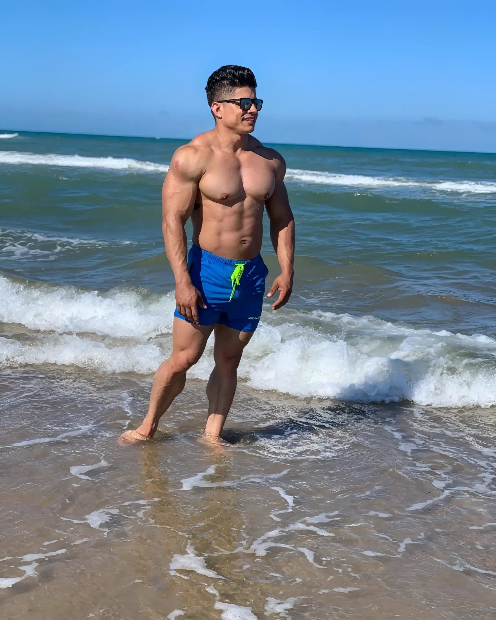 Jed north agile bodybuilding 4 inch aqua blue swim trunks with neon green drawstring and zipper pockets