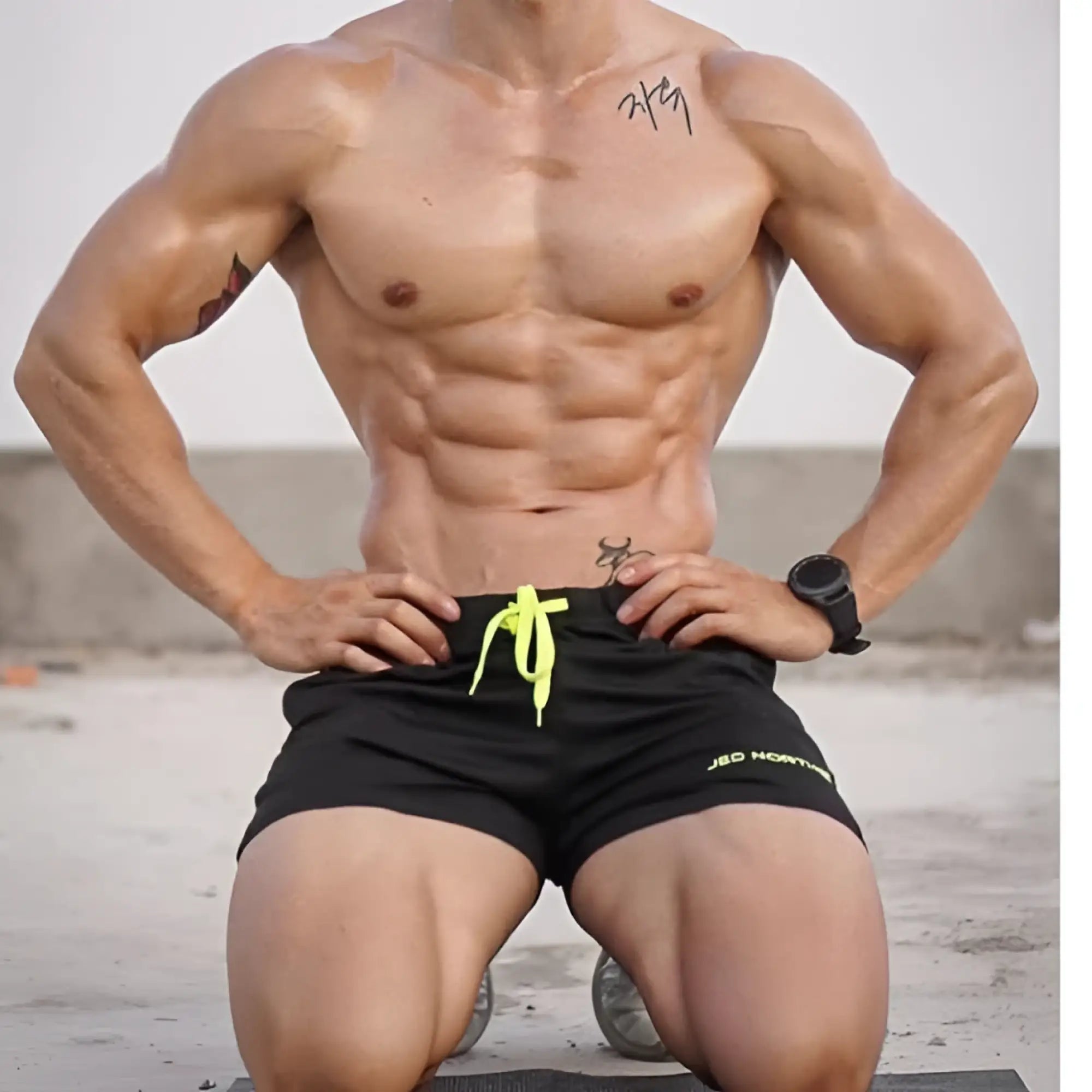 Black jed north agile bodybuilding 4 inch shorts with neon yellow drawstring and zipper pockets for workout use