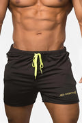 Black jed north agile bodybuilding 4 inch shorts with neon yellow drawstring and branded side zipper pockets