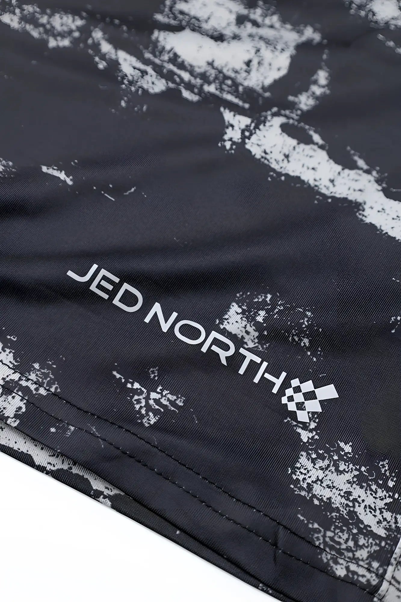 Agile bodybuilding 4 inch black athletic shorts with white distressed pattern silver jed north branding and zipper pockets