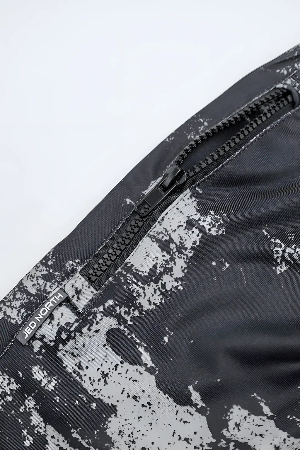 Agile bodybuilding 4 inch shorts with zipper pockets in brushed black splatter fabric by jed north