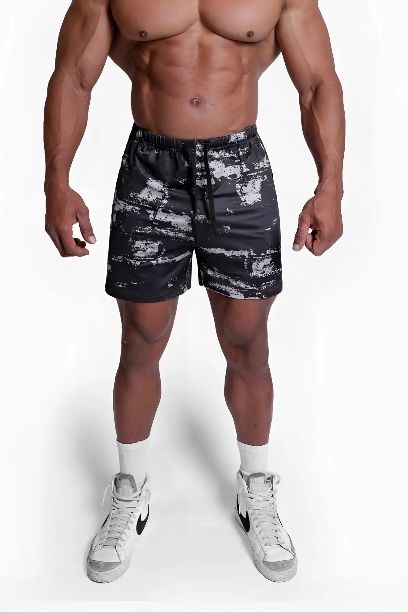 Agile bodybuilding 4 inch shorts with zipper pockets in black and white distressed pattern with elastic waistband