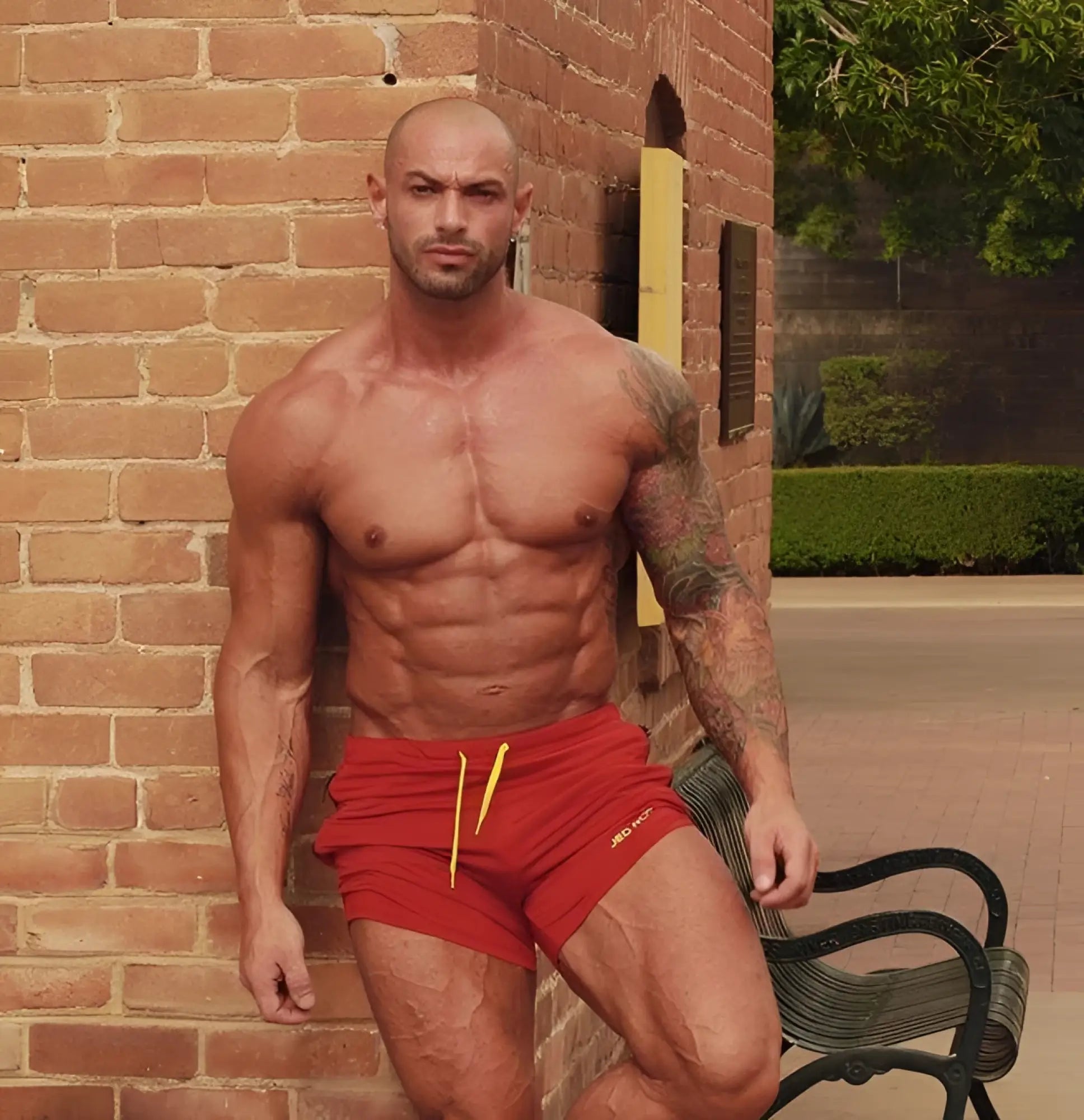 Jed North agile bodybuilding crimson red shorts with yellow drawstrings small logo and zipper pockets for gym use