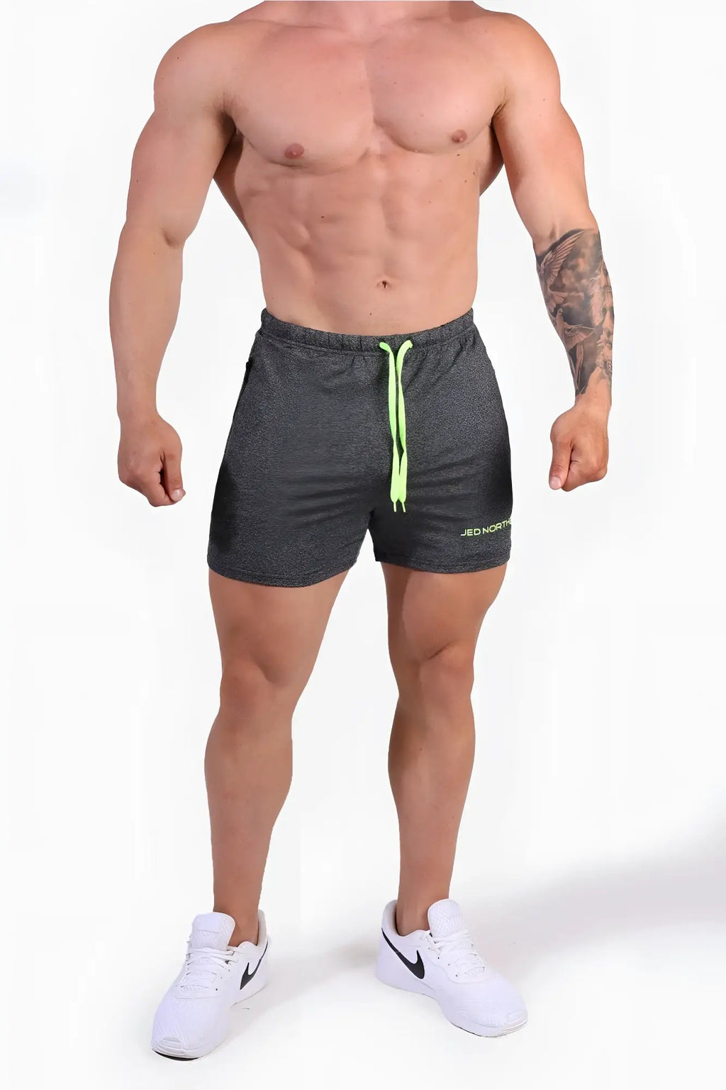 Dark gray heather jed north agile bodybuilding 4 inch shorts with neon green drawstrings and zipper pockets