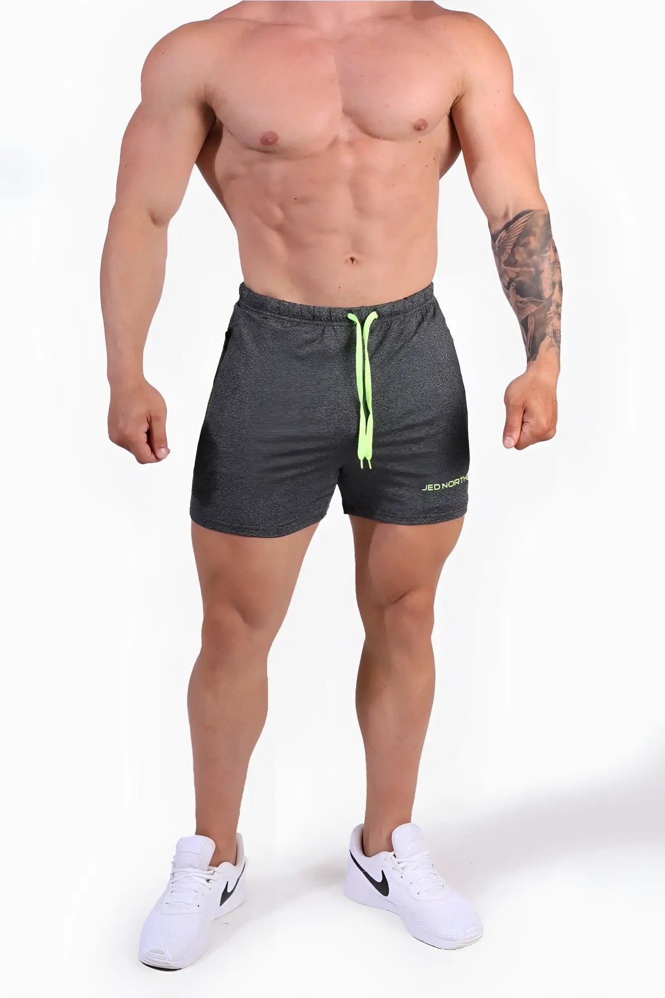 Dark gray heather jed north agile bodybuilding 4 inch shorts with neon green drawstrings and zipper pockets