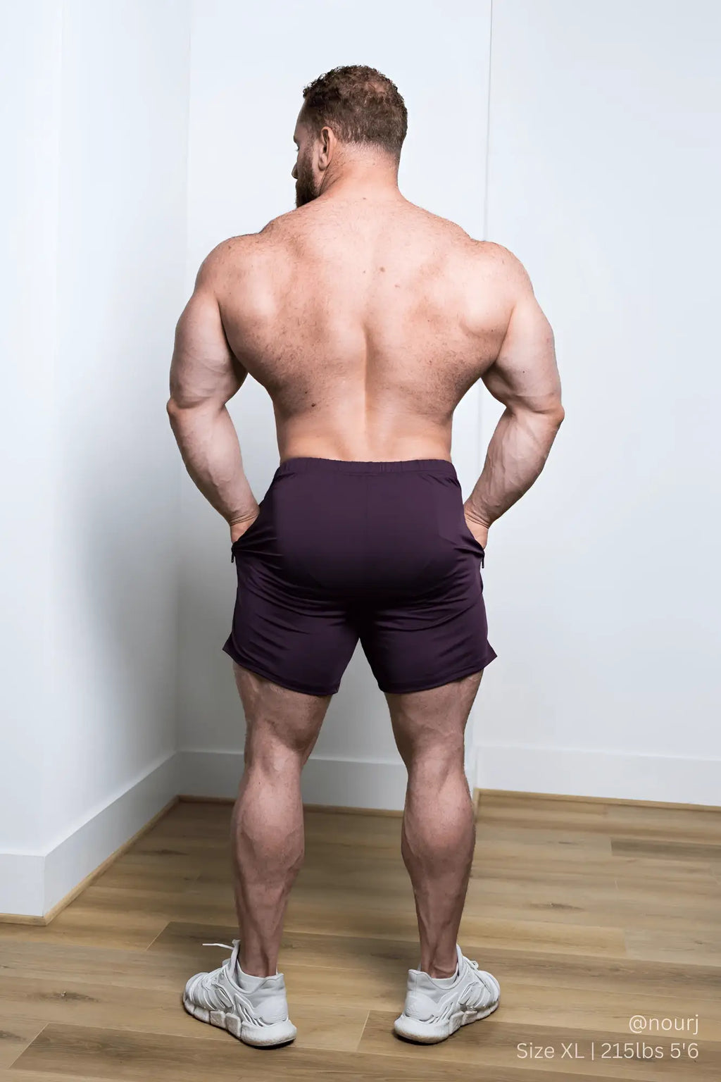 Dark purple jed north agile bodybuilding 4 inch athletic shorts with zipper pockets and sleek form fitting design