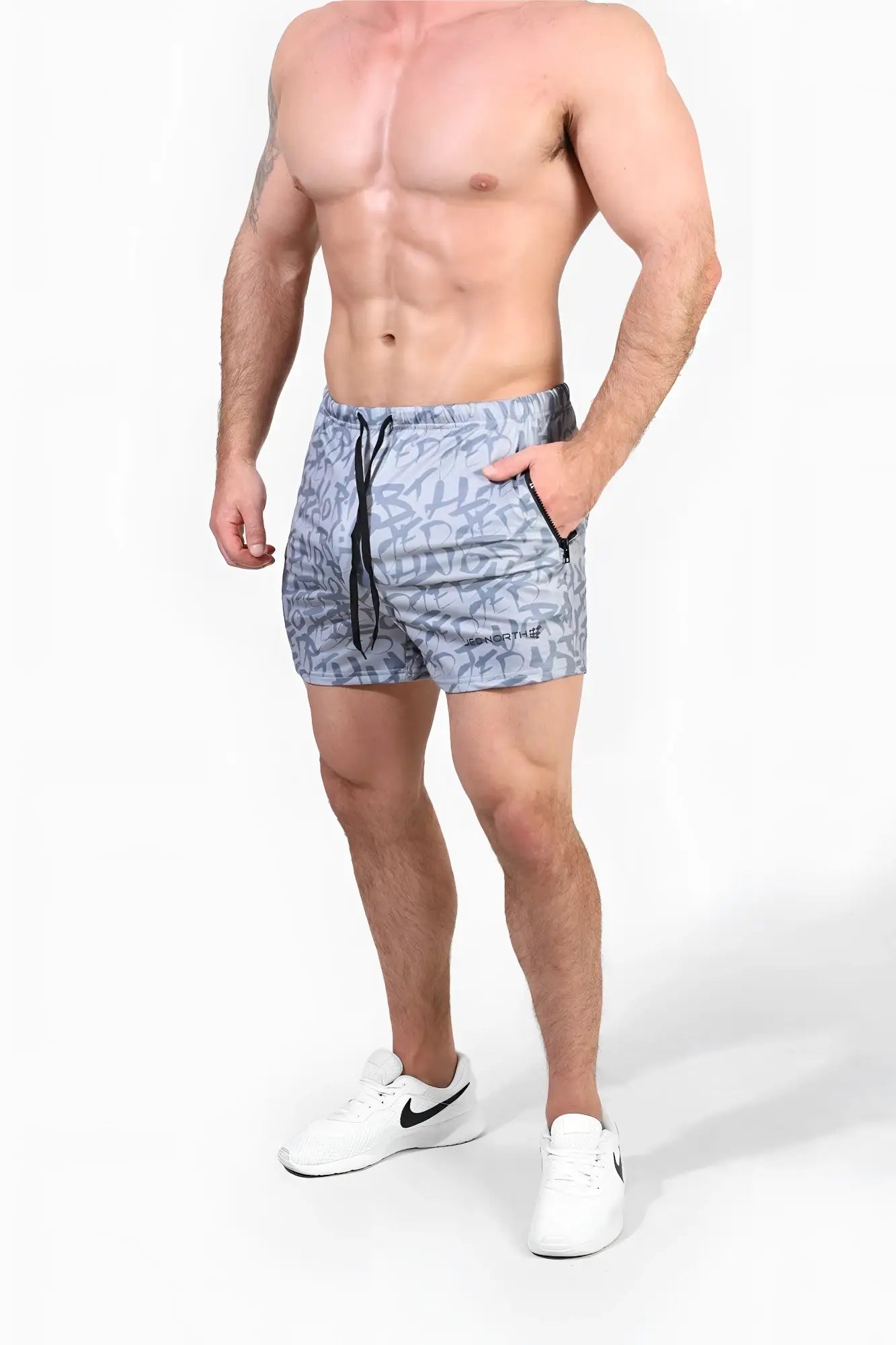 Gray graffiti jed north agile bodybuilding 4 inch athletic shorts with black drawstring and side zipper pockets