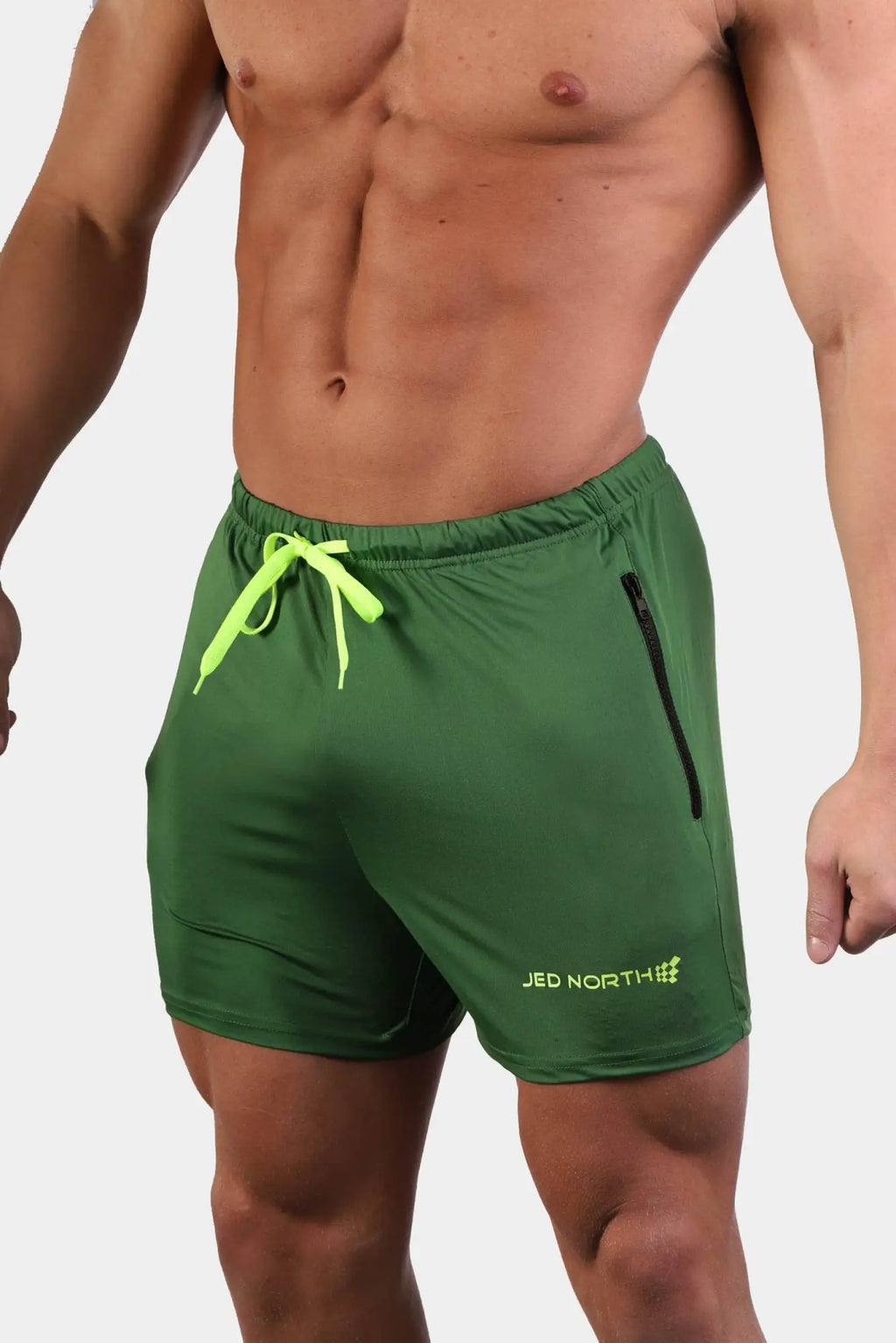 Green Jed North Agile bodybuilding 4 inch athletic shorts with neon yellow drawstring and zipper pocket on left leg