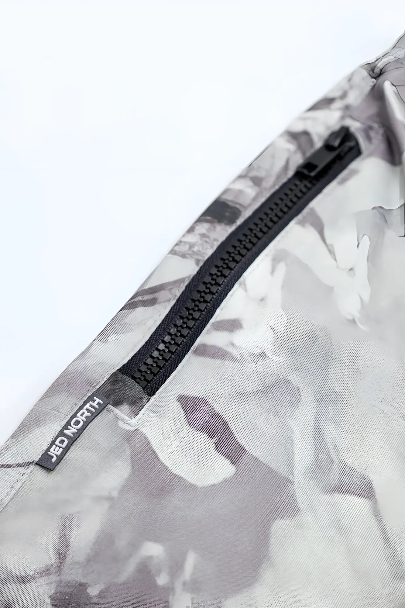 Agile bodybuilding 4 inch shorts with black zipper pockets in gray white leaf camouflage fabric by jed north