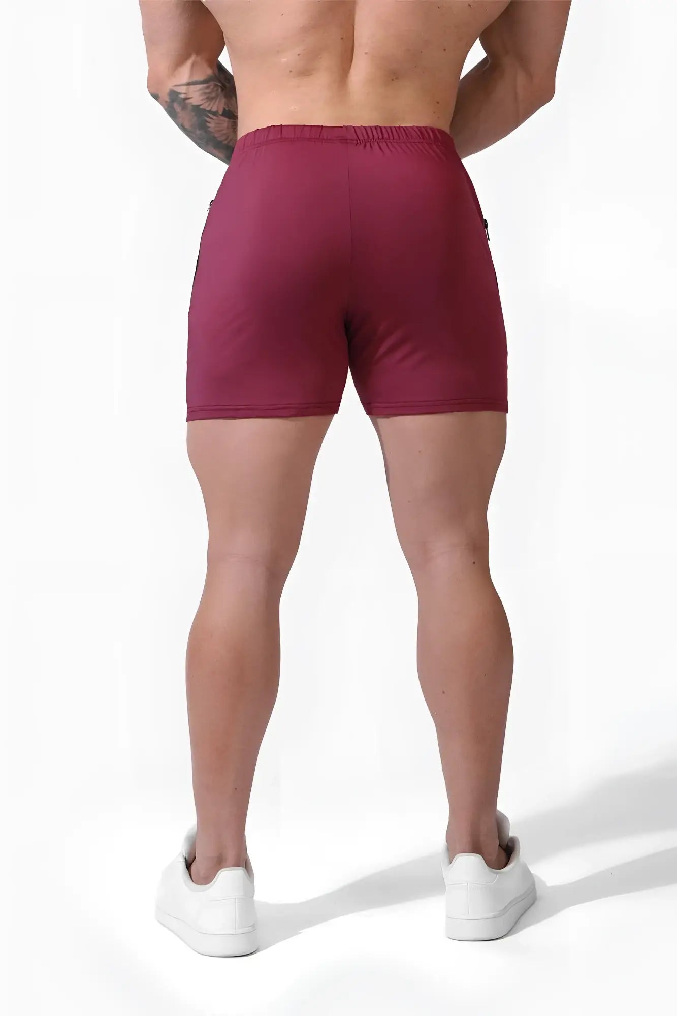 Maroon jed north agile bodybuilding 4 inch athletic shorts with elastic waistband zipper pockets and form-fitting design