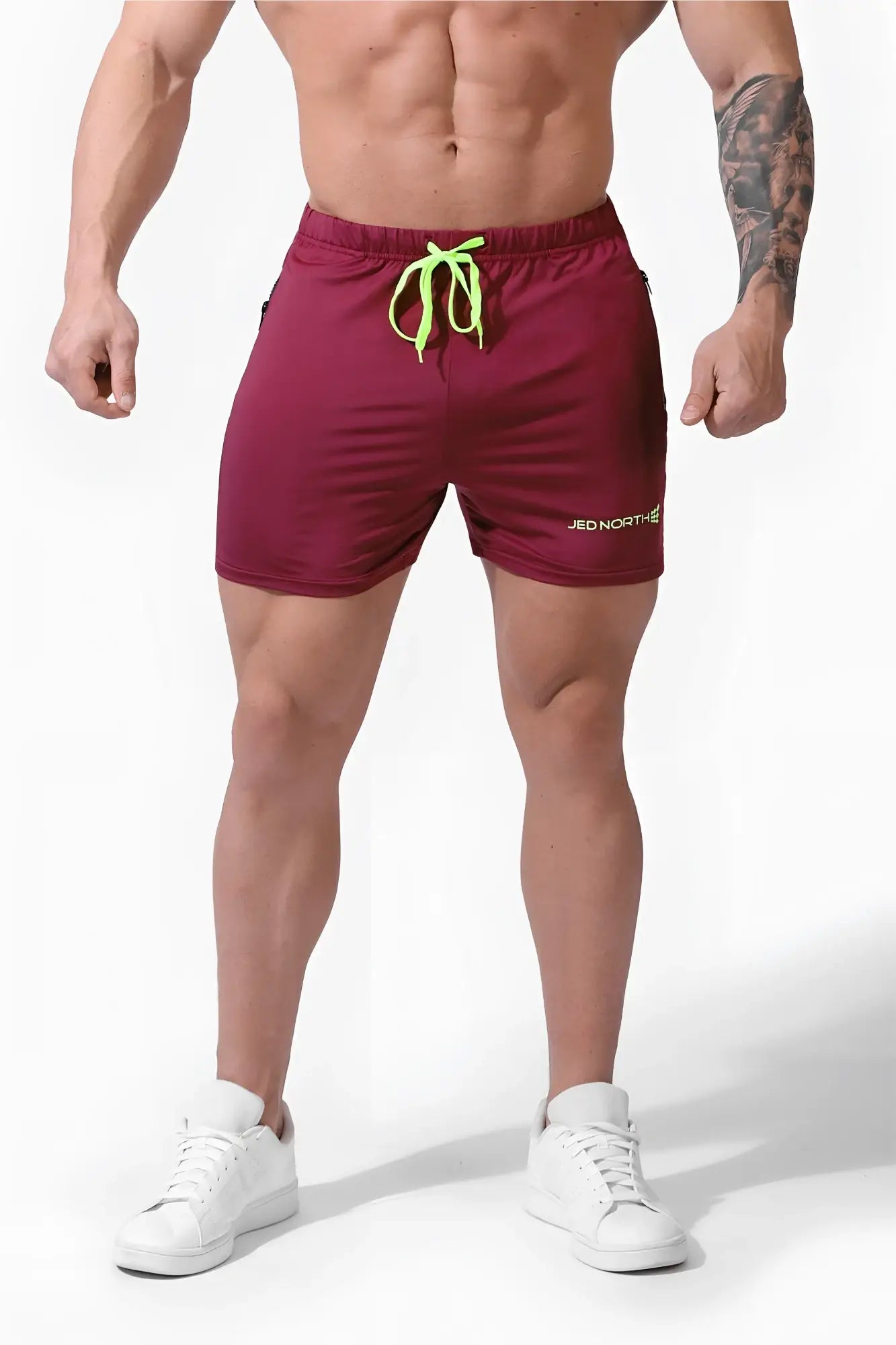 Maroon Jed North Agile bodybuilding 4 inch shorts with neon green drawstrings and zipper pockets for gym use