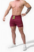 Jed North Agile Bodybuilding 4 inch maroon athletic shorts with neon green drawstrings and subtle side brand logo