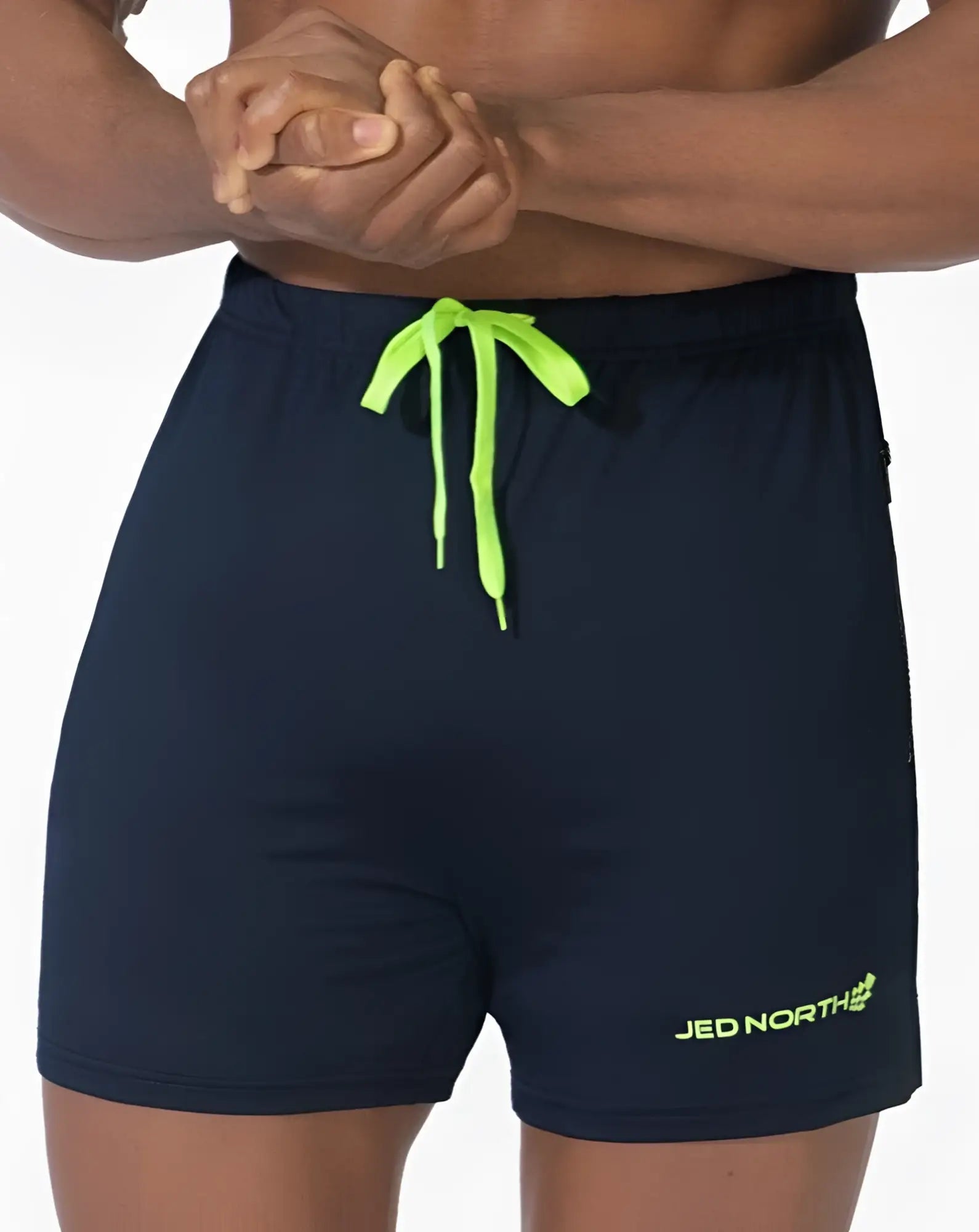 Navy blue jed north agile bodybuilding 4 inch shorts with neon green drawstring and logo branding with zipper pockets