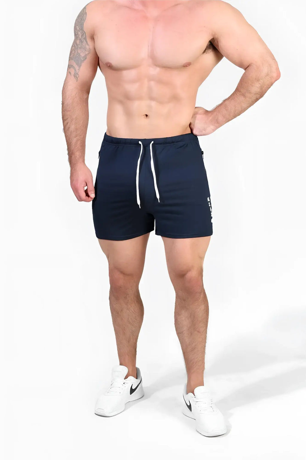 Navy blue jed north agile bodybuilding shorts with white drawstrings zipper pockets and side logo for activewear