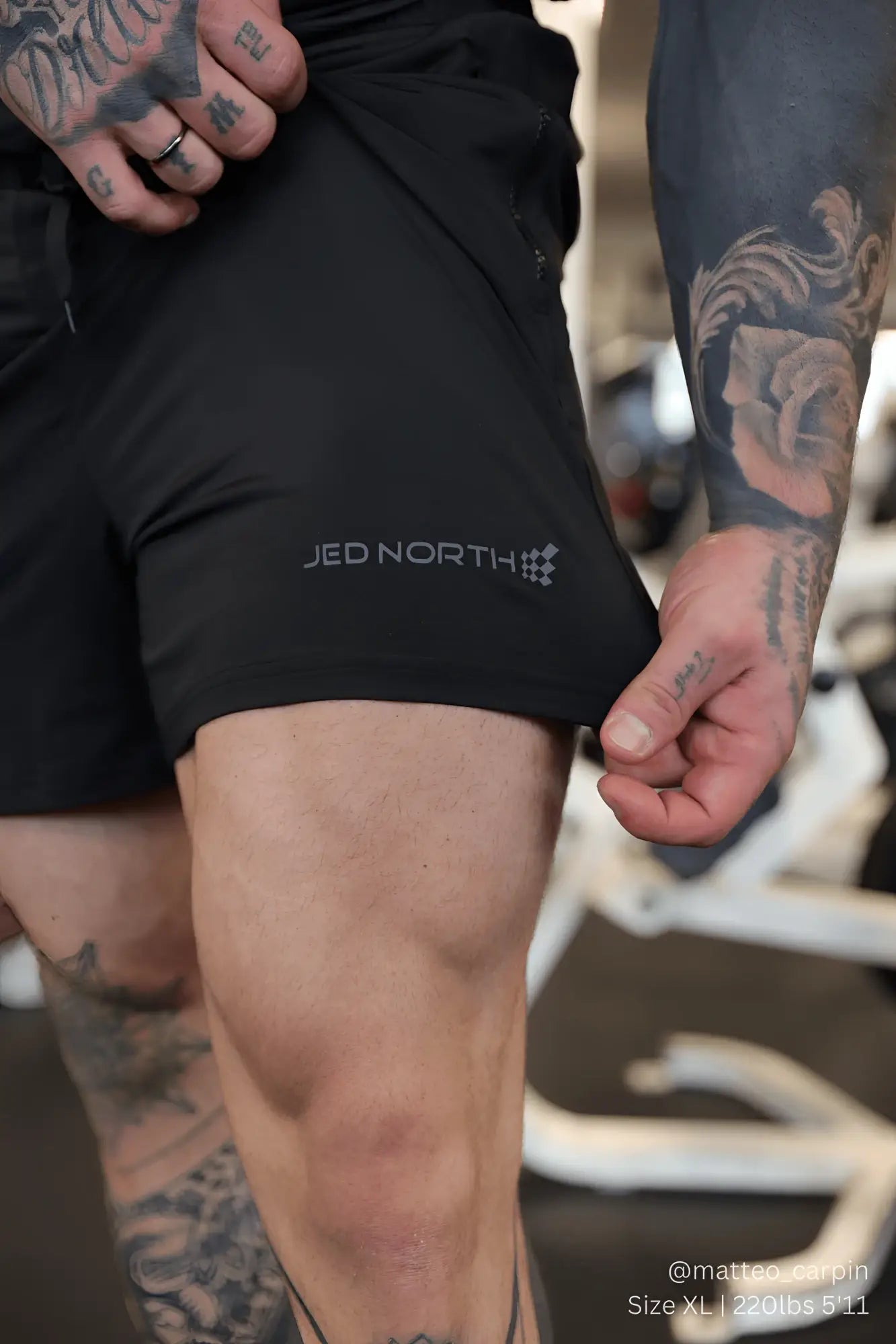 Black jed north agile bodybuilding shorts with subtle gray logo and zipper pockets for active training