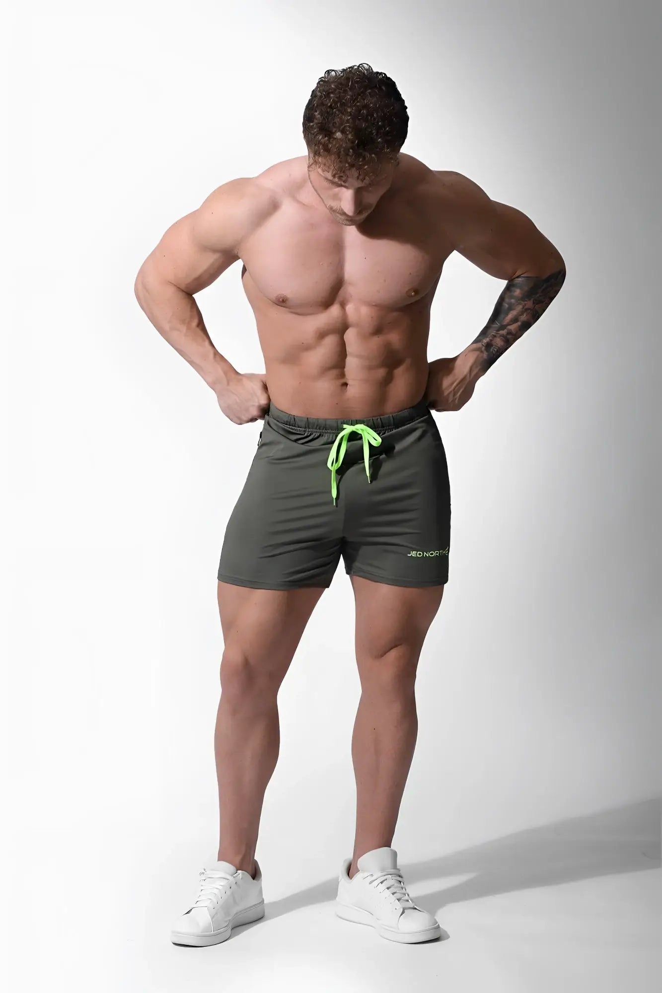 Jed North agile bodybuilding olive shorts with bright neon lime drawstring and zipper pockets for active use