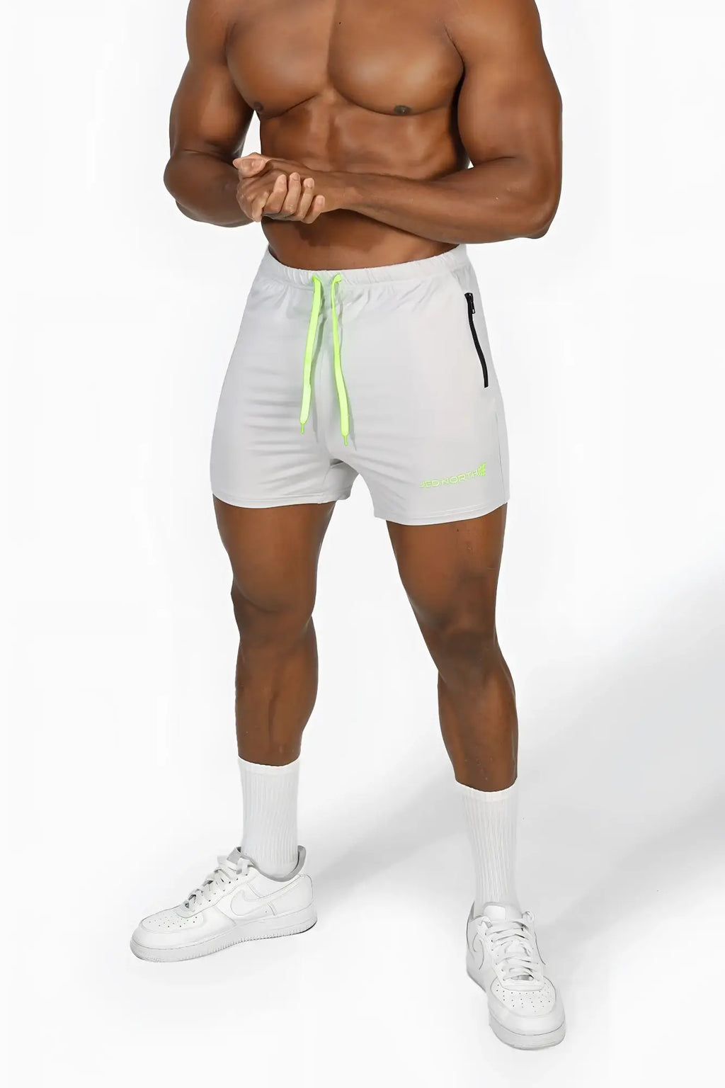 Jed north agile bodybuilding 4 inch platinum gray athletic shorts with neon green drawstrings and black zipper pocket