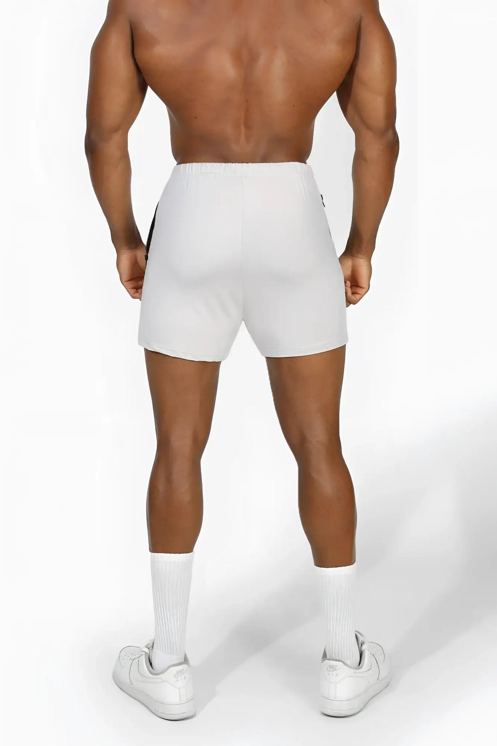 Jed north agile bodybuilding 4 inch white athletic shorts with black side panels and zipper pockets for workouts