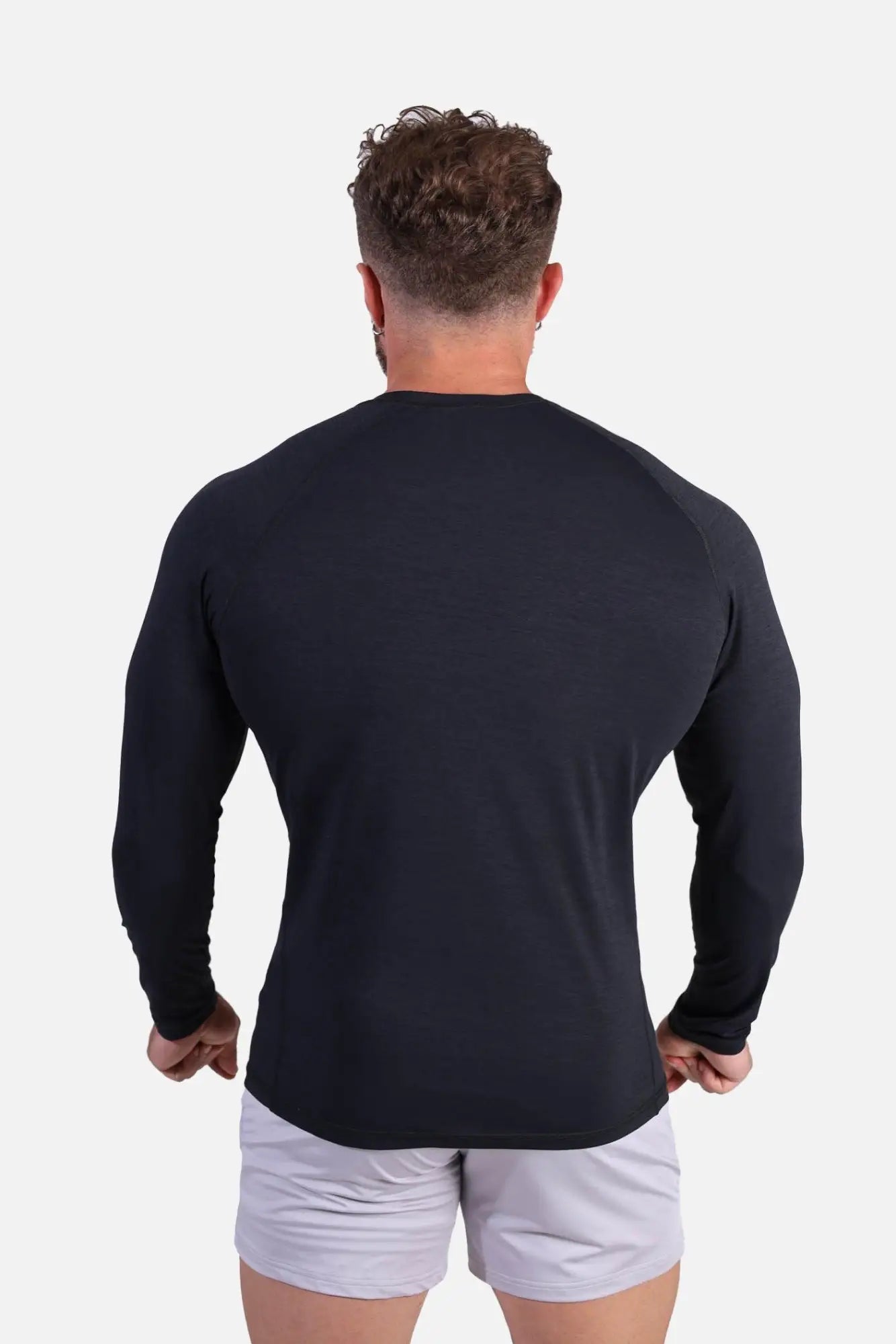 Black jed north agile long sleeve training tee with fitted cut and raglan sleeves for activewear use