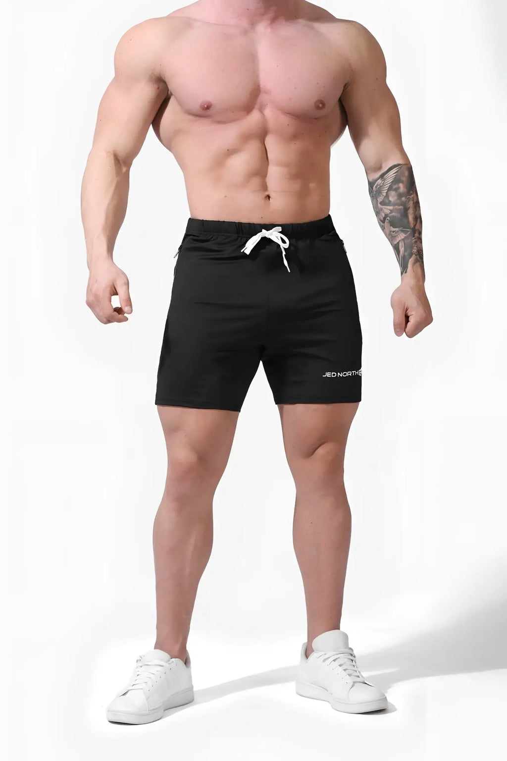 Jed North Agile Plus 6.5 inch black athletic shorts with white drawstring and zipper pockets for bodybuilding use