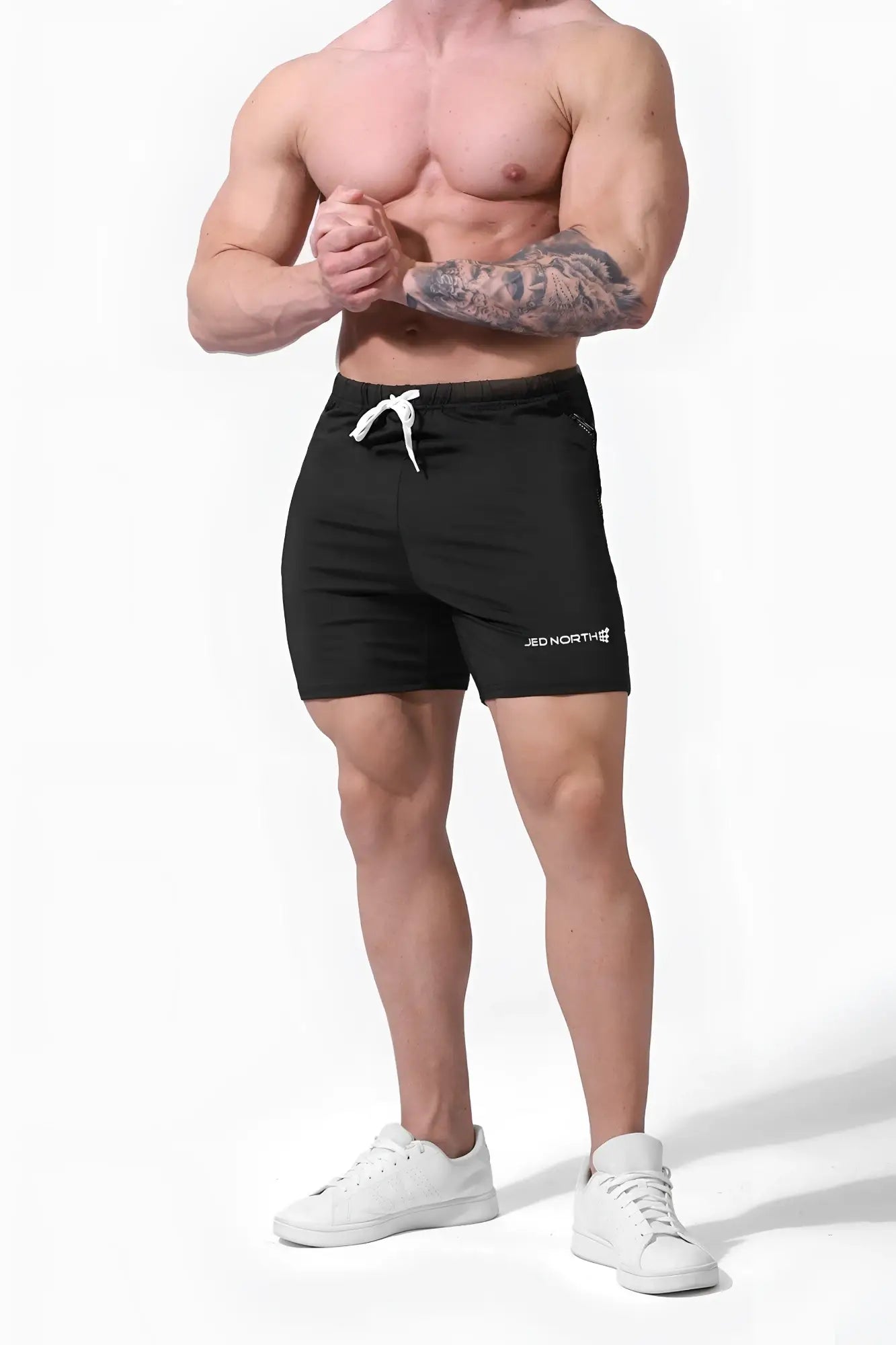 Jed North Agile Plus 65 inch black athletic bodybuilding shorts with white drawstring and logo on the left leg