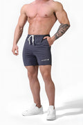 Dark gray Jed North Agile Plus 6.5 inch bodybuilding shorts with white drawstrings and zipper pockets for gym use