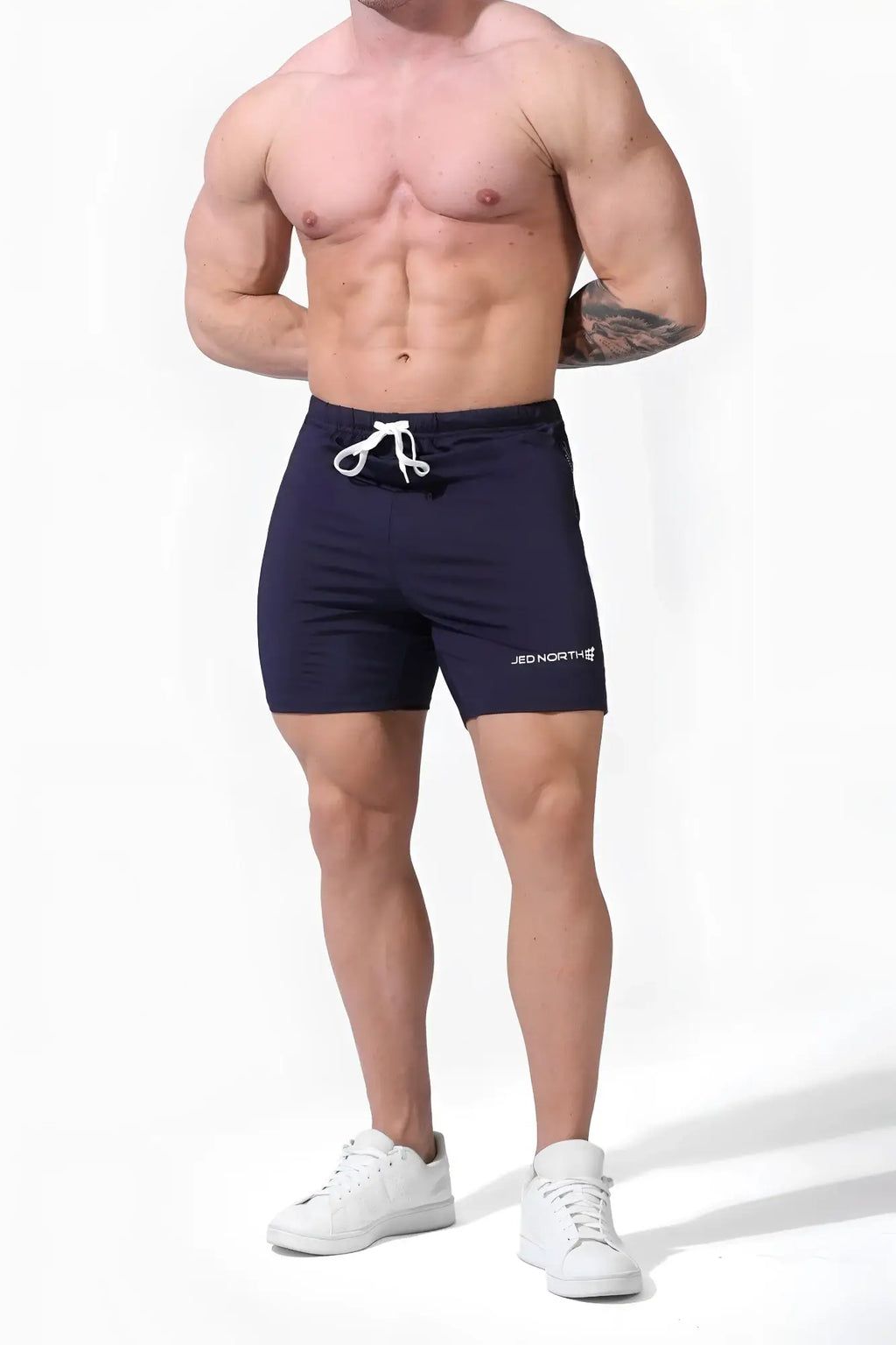 Navy blue Jed North Agile Plus 6.5 inch bodybuilding shorts with white drawstring and zipper pockets for gym use