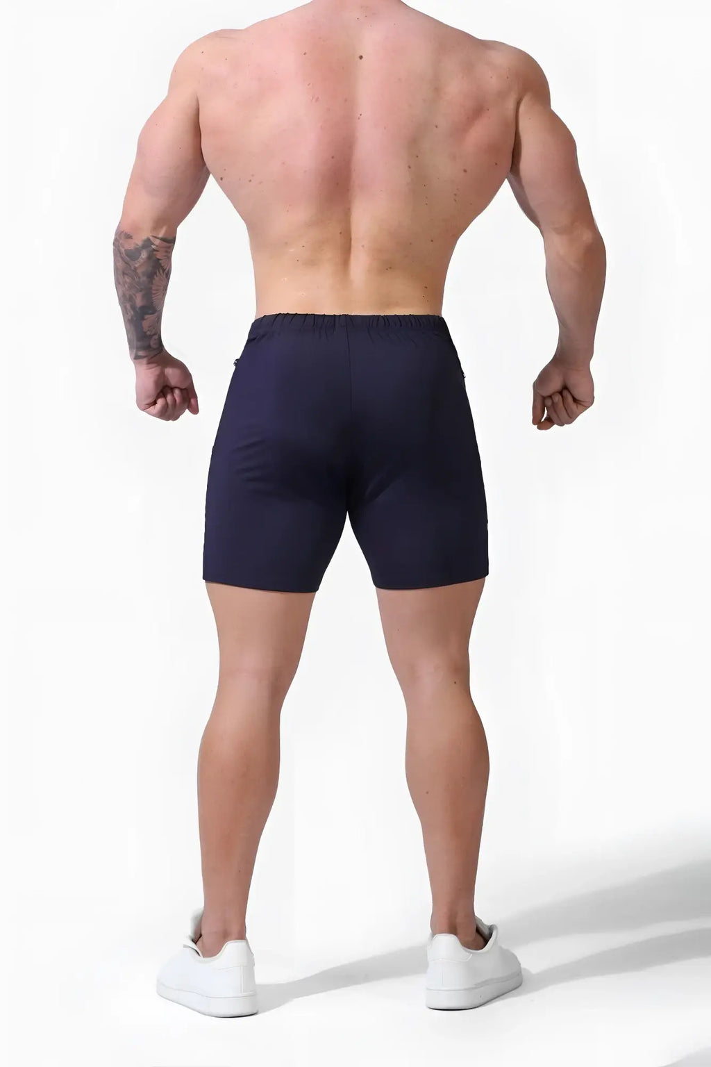 Navy blue Jed North Agile Plus 6.5 inch athletic shorts with elastic waistband and zipper pockets for bodybuilding