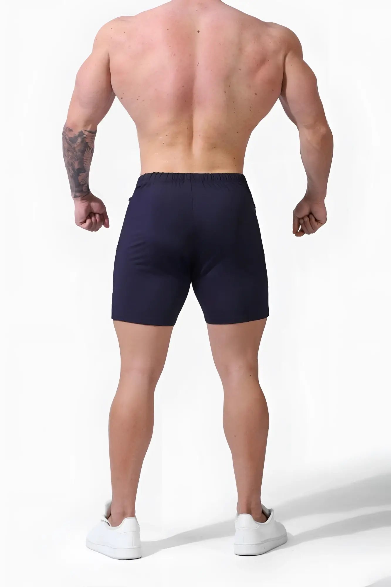 Navy blue Jed North Agile Plus 6.5 inch athletic shorts with elastic waistband and zipper pockets for bodybuilding