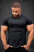 Charcoal black jed north agile short sleeve training tee with white jed north logo for athletic use