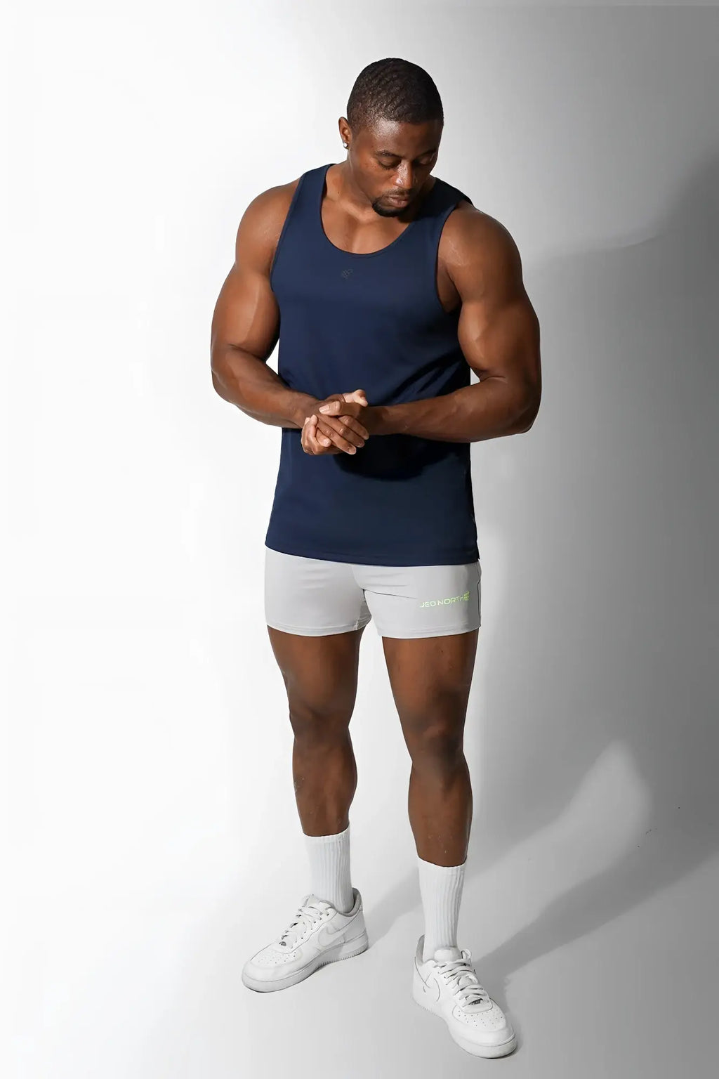 Jed North Alpha microfiber fast-dry gym tank top in space blue with sleeveless design and subtle lower right branding