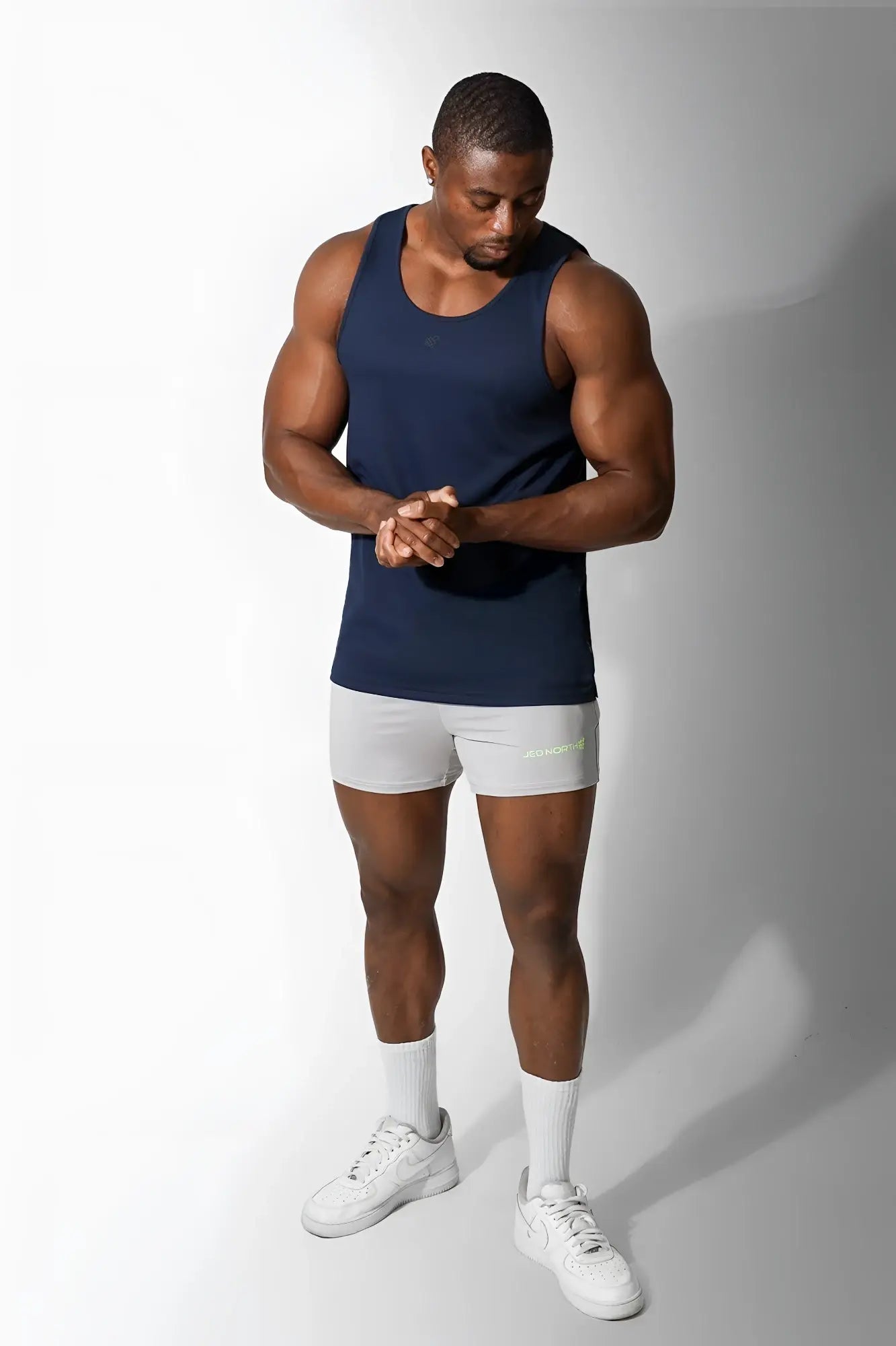 Jed North Alpha microfiber fast-dry gym tank top in space blue with sleeveless design and subtle lower right branding